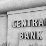 Central bank building representing monetary policy and bond market signals